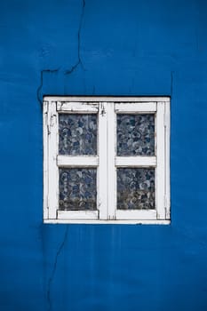 Blue wall with retro window