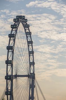Singapore flyer with morning sky cloud