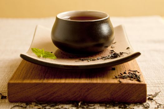 Black tea still life close up in beautifull ceramics.