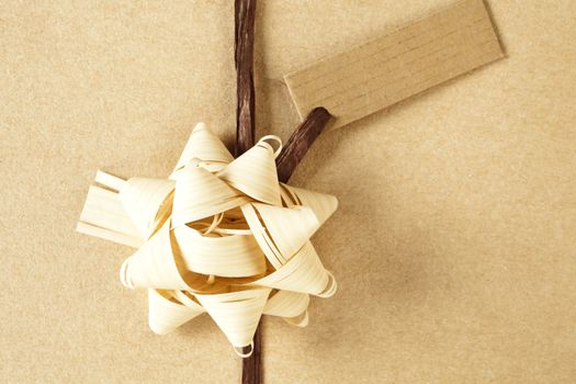 Beautifully naturally wrapped gift with label and copy space.