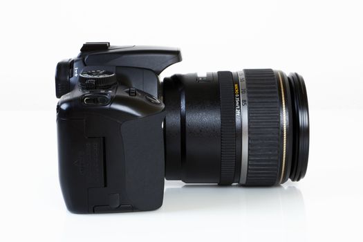 Digital Single Lens Reflex Camera on white background.