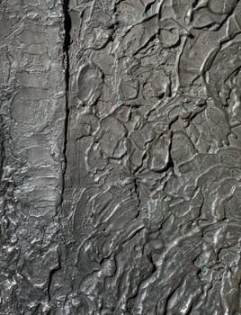 Bronze surface. Rough cast of bronze as background or backdrop.