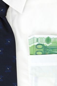 Businessman with white shirt with blue tie and money in his pocket. Salary or bribe? 