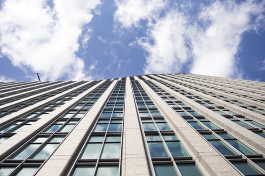 Modern building with glass to the blue sky