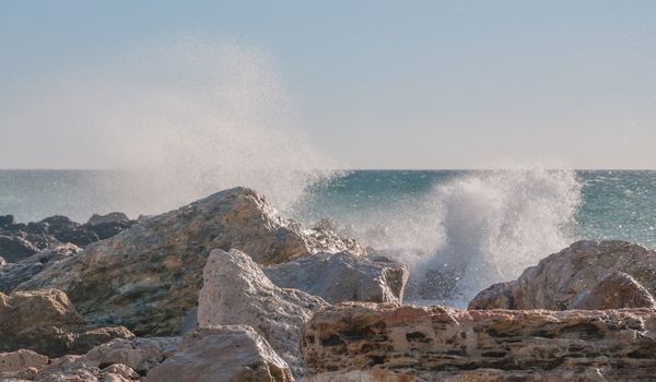 Crashing wave, limestone rocks, Majorca, Balearic islands, Spain.