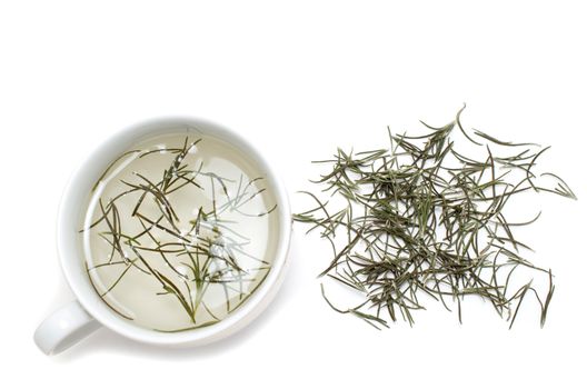 Homemade rosemary tea on white background