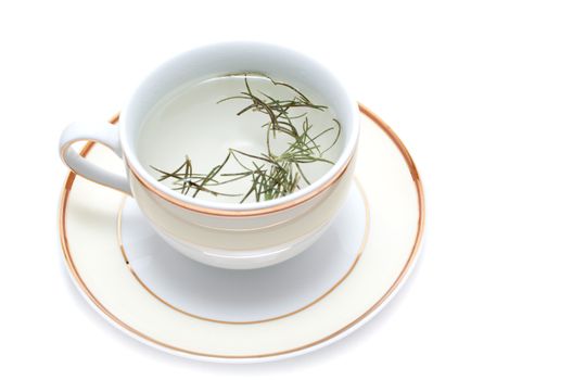 Homemade rosemary tea on white background