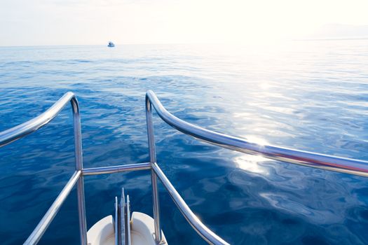 Boat bow sailing in blue calm sea ocean at blue Mediterranean