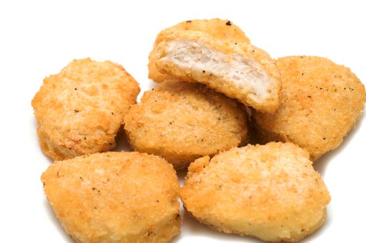 Fried chicken nuggets on white background