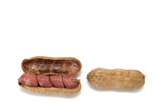 Boiled peanuts in shell on white background