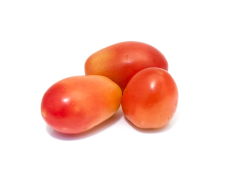 fresh tomatoes isolated on a white background