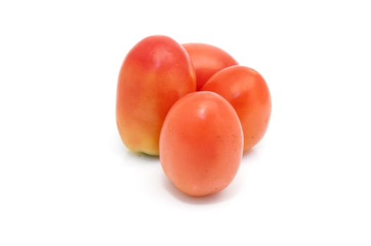 fresh tomatoes isolated on a white background
