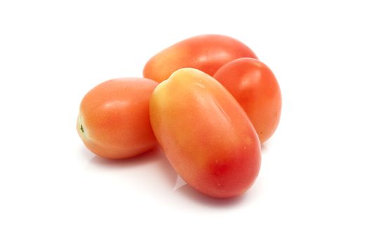 fresh tomatoes isolated on a white background