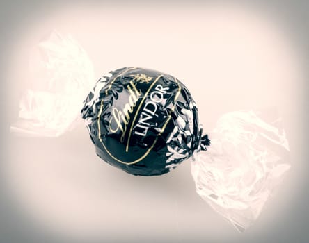 AYTOS, BULGARIA - APRIL 02, 2014: Milk Chocolate LINDOR truffle. Lindt & Spr��ngli is recognized as a leader in the market for premium quality chocolate.