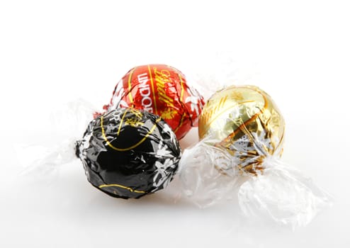 AYTOS, BULGARIA - APRIL 02, 2014: Milk Chocolate LINDOR truffle. Lindt & Spr��ngli is recognized as a leader in the market for premium quality chocolate.