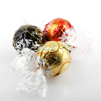 AYTOS, BULGARIA - APRIL 02, 2014: Milk Chocolate LINDOR truffle. Lindt & Spr��ngli is recognized as a leader in the market for premium quality chocolate.