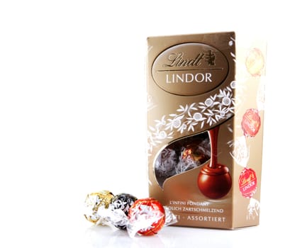 AYTOS, BULGARIA - APRIL 02, 2014: Milk Chocolate LINDOR truffle. Lindt & Spr��ngli is recognized as a leader in the market for premium quality chocolate.