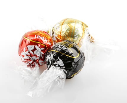 AYTOS, BULGARIA - APRIL 02, 2014: Milk Chocolate LINDOR truffle. Lindt & Spr��ngli is recognized as a leader in the market for premium quality chocolate.