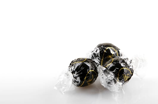 AYTOS, BULGARIA - APRIL 02, 2014: Milk Chocolate LINDOR truffle. Lindt & Spr��ngli is recognized as a leader in the market for premium quality chocolate.