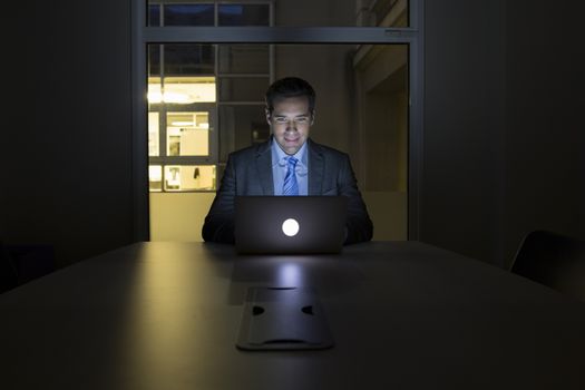 Male business computer desk evening tired busy