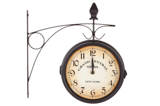 Classic vintage railway station clock isolated on white background. Retro antique timepiece.