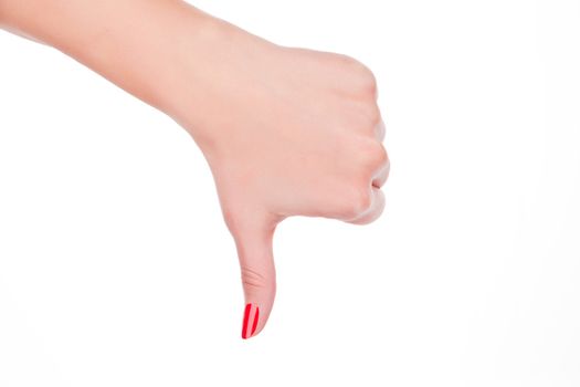 Fail. Female hand with red fingernails showing the fail sign isolated on white background.