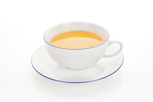 White teacup with green tea isolated on white with clipping path. 