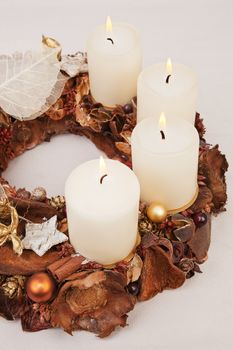 Traditional handmade brown christmas wreath isolated. Traditional christmas concept.