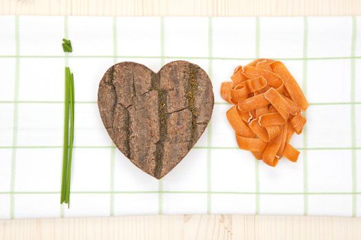 I love pasta made of fresh chive, heart shaped wood and pasta.