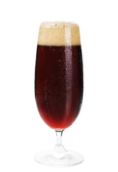 Cold dark beer with foam in beer glass isolated on white background with clipping path.