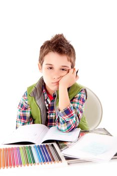 Portrait of a little boy at school over white background