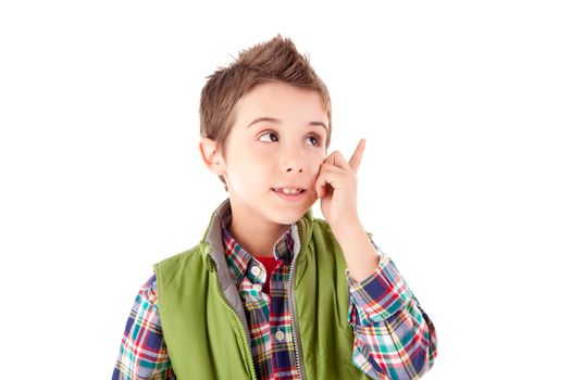 Smiling little boy posing over white background