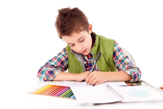 Portrait of a little boy at school over white background