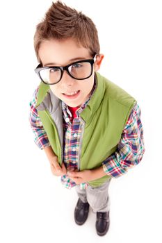 Smiling little boy posing over white background