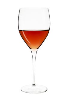 Elegant crystal wine glass with rose isolated on white background with clipping path.