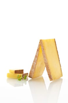 Luxurious cheese arranged on white background.