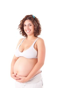 Beautiful pregnant woman showing her good shape over white background