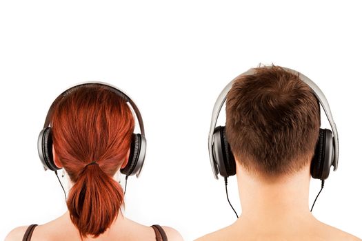 Couple with headphones isolated on white. Back view.