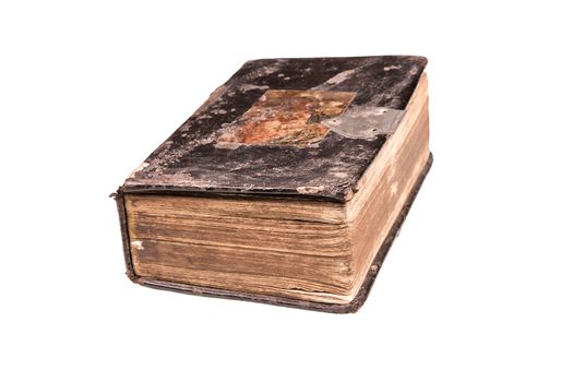 Old antique bible book isolated on white background with clipping path.