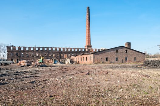 Old ruined brick factory in afternoon sun