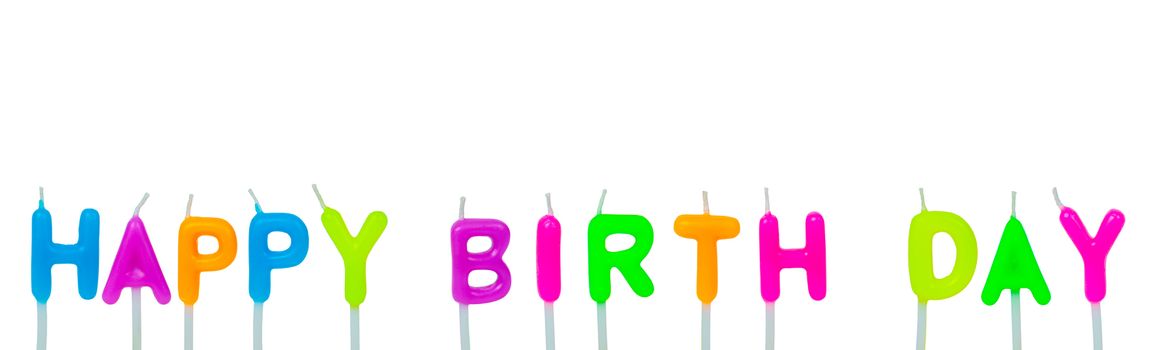 Colorful happy birthday candles on white background