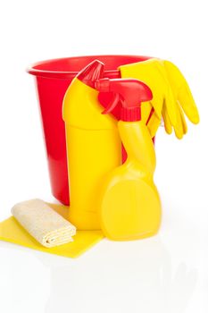 Cleaning products - bucket, gloves and sponge in yellow and red isolated on white background. Purity concept.