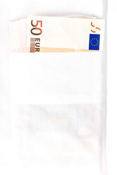 Fifty euro banknotes in white dress shirt pocket close up. Salary or corruption? Wealth or debt?