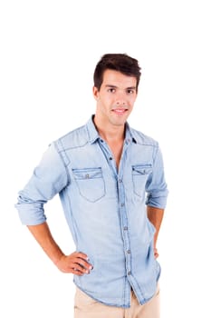 Portrait of handsome young man in casual clothes standing over white background