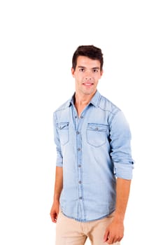 Portrait of handsome young man in casual clothes standing over white background