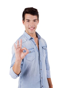 Beautiful man doing ok sign over white background