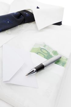 Traditional business background. Blue necktie, white dress shirt, white envelope, luxurious pen and money in pocket. 