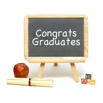 A sign congratulating the new graduates of school.