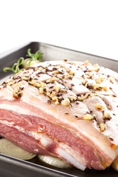 Delicious pork belly roast with garlic and cumin. Culinary meat eating.