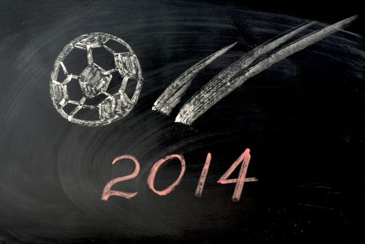 Football Year of 2014 written with chalk on a blackboard